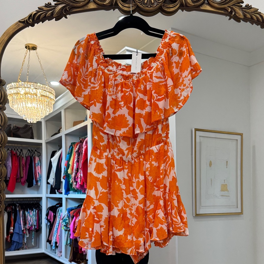 From Vici: Sugarlips Orange Floral Ruffle Romper